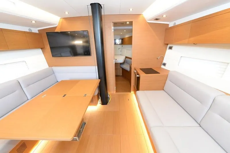  Yacht Photos Pics Luxurious interior of 2019 Grand Soleil 48 Performance yacht with modern furnishings.