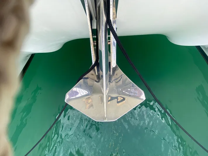 Luna Yacht Photos Pics Anchor of 2020 Fountaine Pajot Saona 47 catamaran in green water.