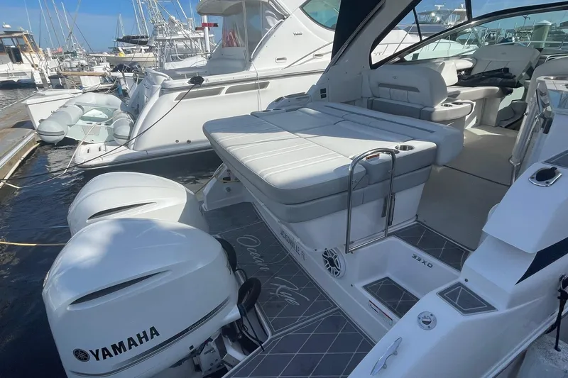 Then Again Yacht Photos Pics 2021 Regal 33 XO boat with Yamaha engines docked at marina.