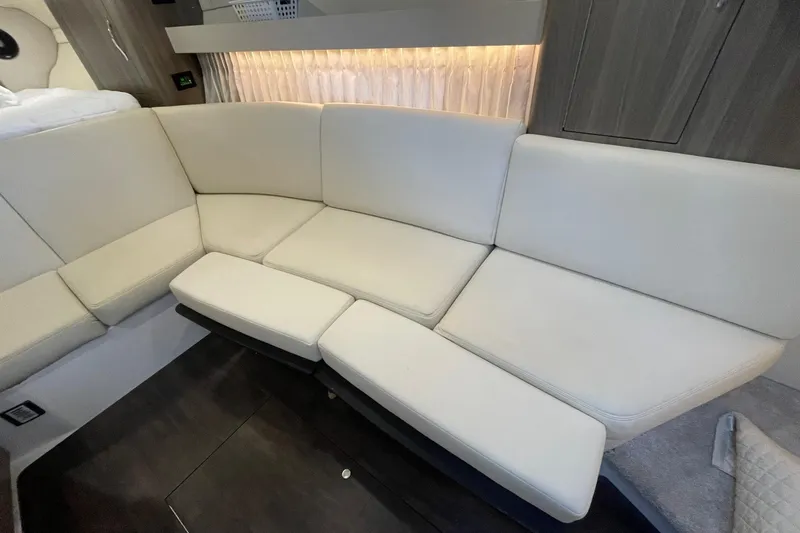 Then Again Yacht Photos Pics 2021 Regal 33 XO interior with cream leather seating and modern design.