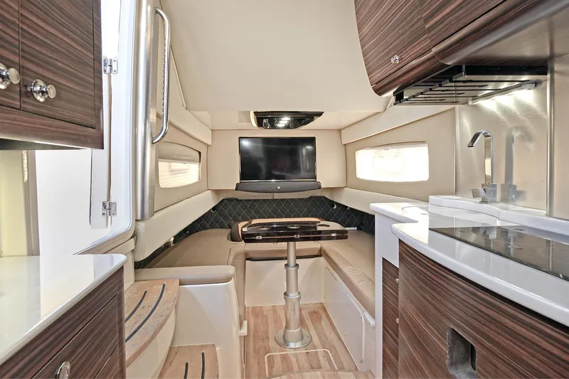  Yacht Photos Pics Luxurious interior of 2016 Scout 420 LXF boat with modern seating and sleek design.