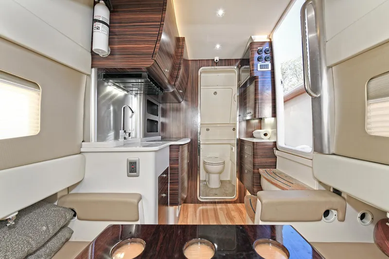  Yacht Photos Pics Luxurious interior of a 2016 Scout 420 LXF yacht with modern amenities.