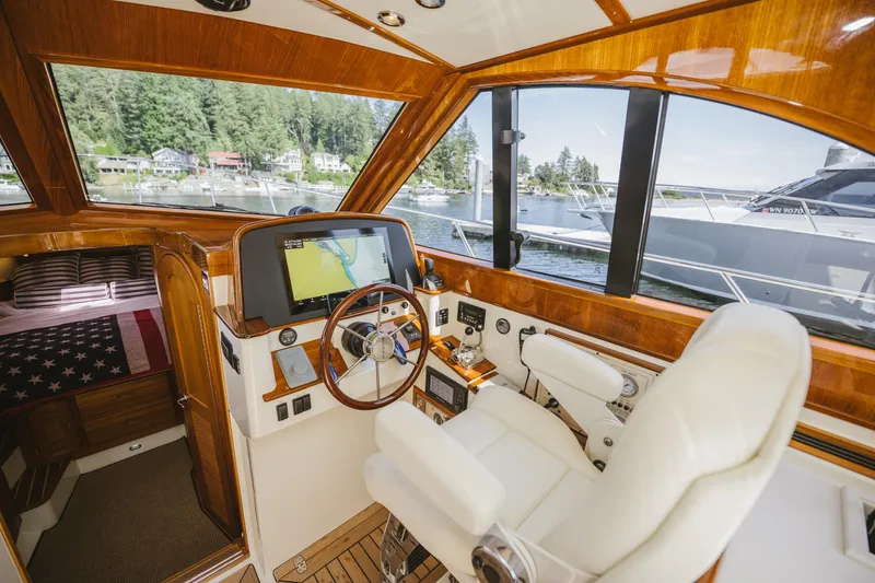 Mm Yacht Photos Pics Luxurious 2010 San Juan SJ40FB IPS yacht interior with navigation controls and scenic view.