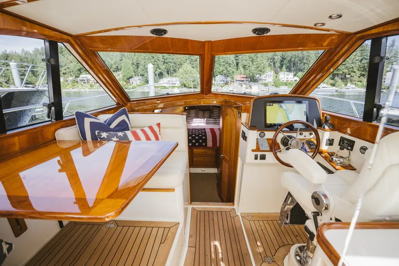 Mm Yacht Photos Pics Luxurious 2010 San Juan SJ40FB IPS yacht interior with wooden finishes and American-themed decor.