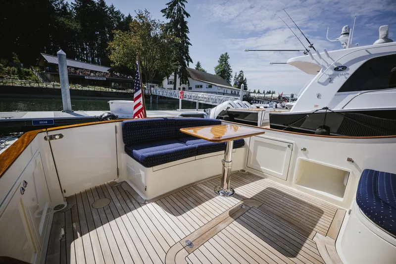 Mm Yacht Photos Pics Spacious deck of 2010 San Juan SJ40FB IPS yacht with seating and table.