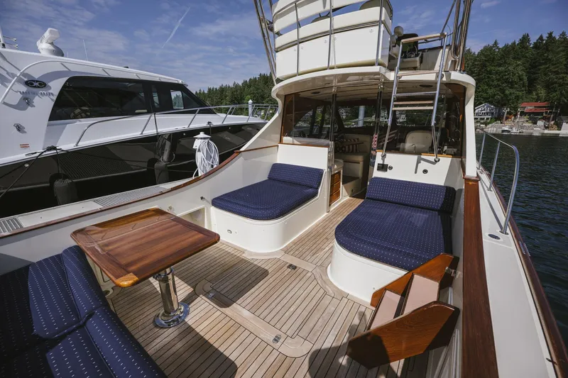 Mm Yacht Photos Pics Luxurious 2010 San Juan SJ40FB IPS yacht with elegant seating and wooden deck.