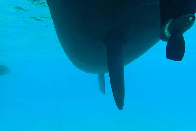 Refaire Yacht Photos Pics Underwater view of 2016 Fountaine Pajot Lucia 40 catamaran hull and propeller.