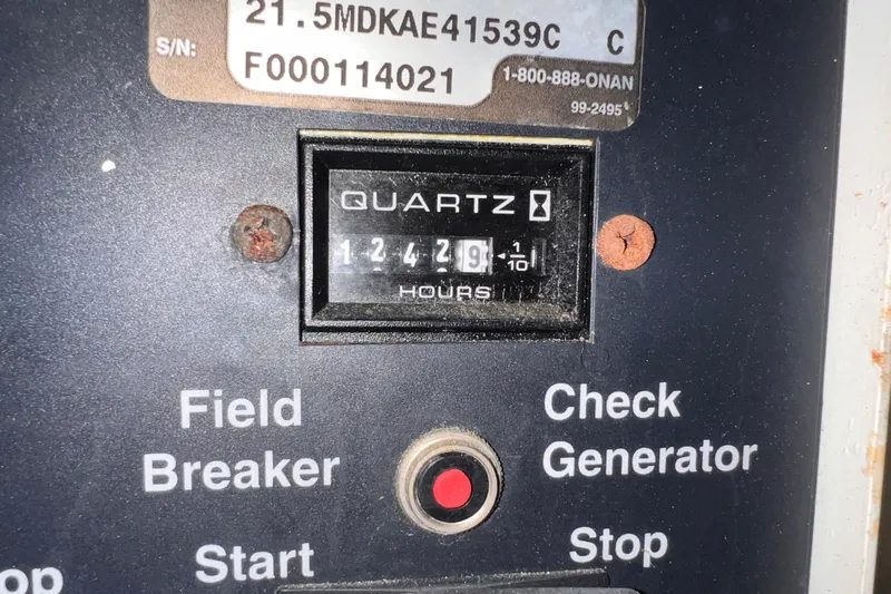 Renegade Yacht Photos Pics Control panel of a 2001 Hatteras 65 Convertible with hour meter reading 12429.9.