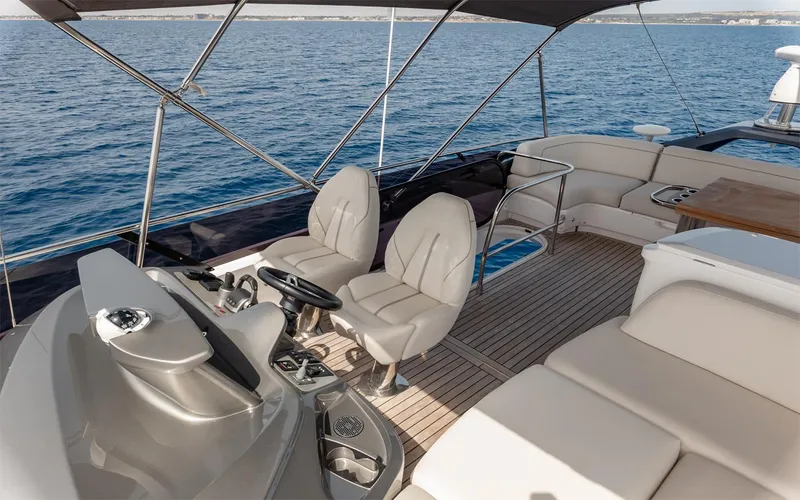  Yacht Photos Pics Luxurious 2023 Princess 45 yacht interior with elegant seating and ocean view.