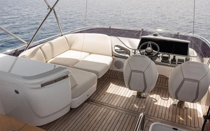  Yacht Photos Pics Luxury yacht Princess 45 cockpit with modern seating and controls, 2023 model.