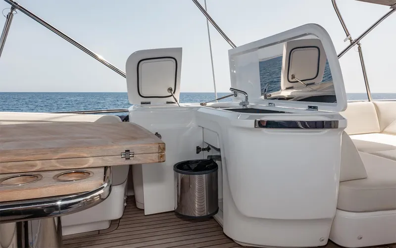  Yacht Photos Pics Luxury yacht Princess 45 interior with kitchenette and ocean view, 2023 model.