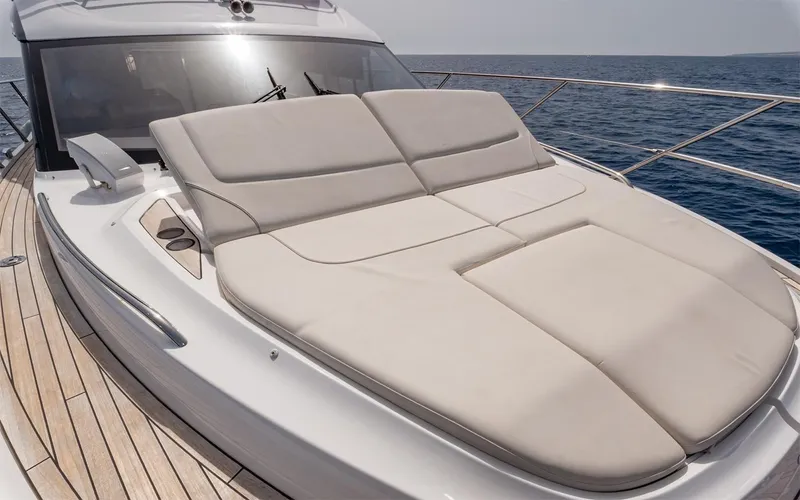  Yacht Photos Pics Luxurious 2023 Princess 45 yacht with spacious sunbathing deck on open sea.