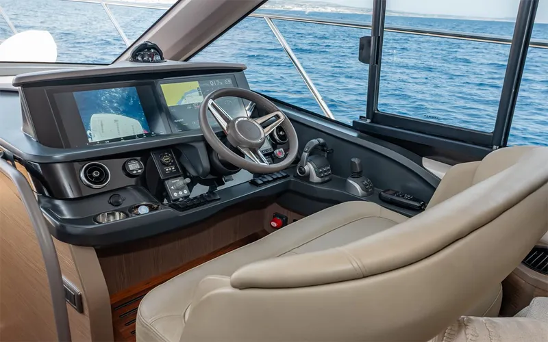  Yacht Photos Pics Luxurious helm of 2023 Princess 45 yacht with modern navigation equipment.