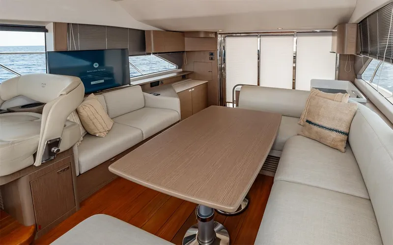  Yacht Photos Pics Luxurious interior of 2023 Princess 45 yacht with elegant seating and dining area.