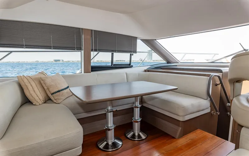 Yacht Photos Pics Luxurious interior of 2023 Princess 45 yacht with elegant seating and ocean view.