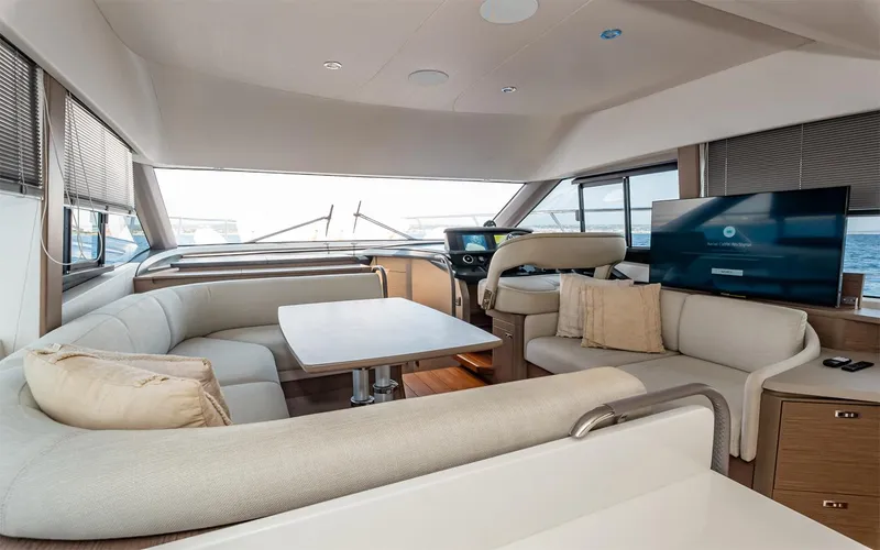  Yacht Photos Pics Luxurious interior of 2023 Princess 45 yacht with modern seating and large windows.
