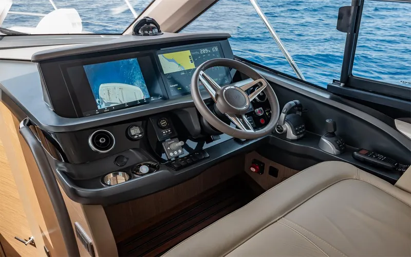  Yacht Photos Pics Modern helm of 2023 Princess 45 yacht with advanced navigation displays and controls.