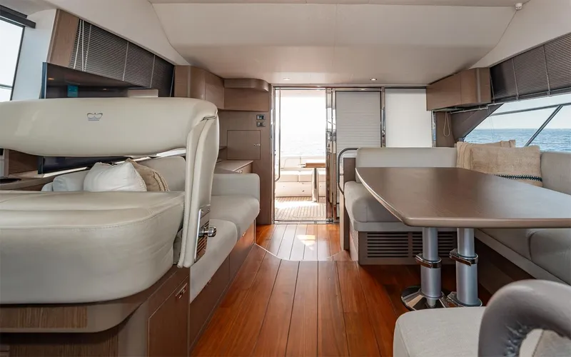  Yacht Photos Pics Luxurious interior of 2023 Princess 45 yacht with elegant seating and dining area.