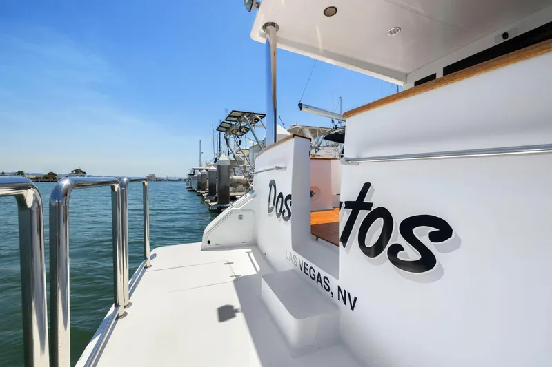 Ds Gatos Yacht Photos Pics Luxury yacht docked at marina, clear blue sky, Symbol 558, 1999 model.