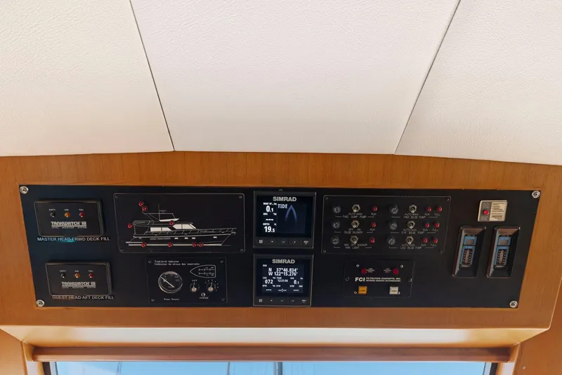 Ds Gatos Yacht Photos Pics Control panel of a 1999 Symbol 558 yacht with navigation and monitoring systems.