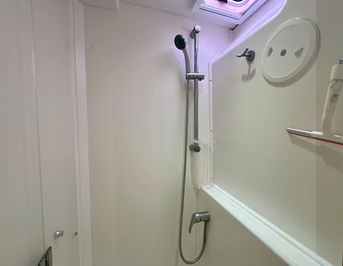 Selkie Yacht Photos Pics Shower area in a 2012 Lagoon 400 yacht, featuring a sleek, modern design.
