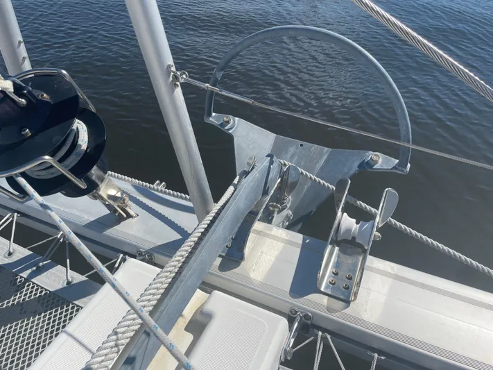 Sun Bums Yacht Photos Pics Anchor system on a 2017 Lagoon 39 catamaran, featuring metal fittings and ropes.