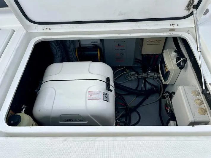 Sun Bums Yacht Photos Pics Engine compartment of a 2017 Lagoon 39 catamaran, featuring mechanical and electrical components.