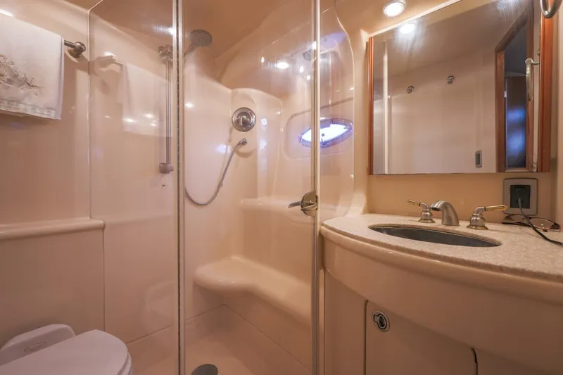 My Gypsy Soul Yacht Photos Pics Luxurious bathroom in 2004 Meridian 411 Sedan yacht with shower and sink.