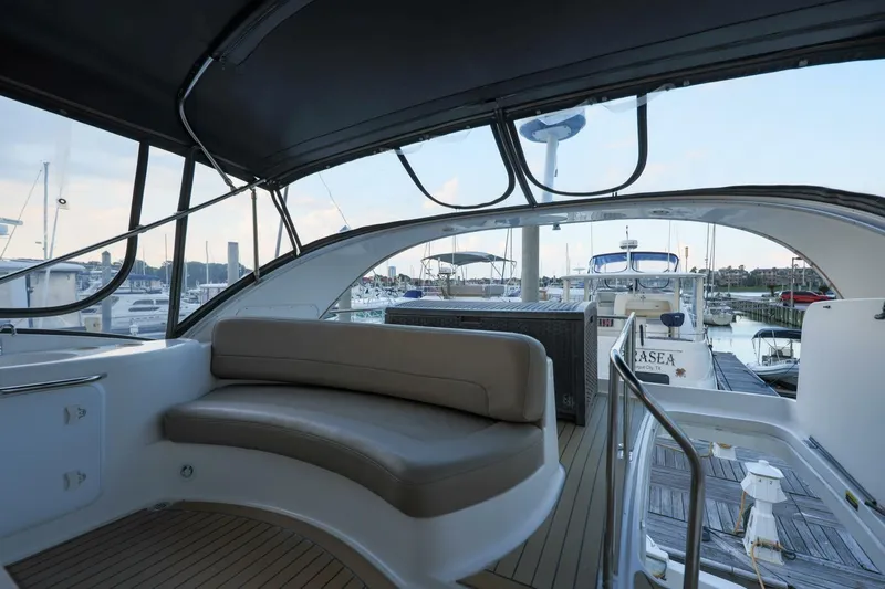 My Gypsy Soul Yacht Photos Pics 2004 Meridian 411 Sedan yacht interior with seating, docked at marina.