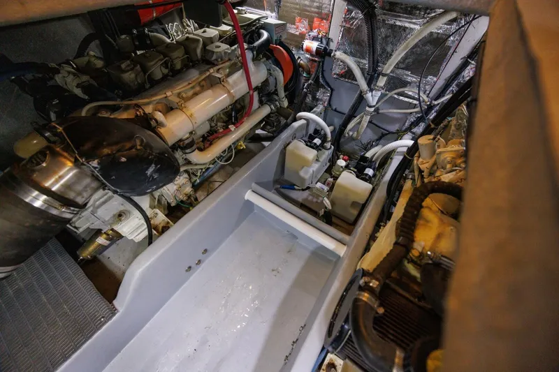 My Gypsy Soul Yacht Photos Pics Engine room of a 2004 Meridian 411 Sedan boat, showcasing mechanical components.