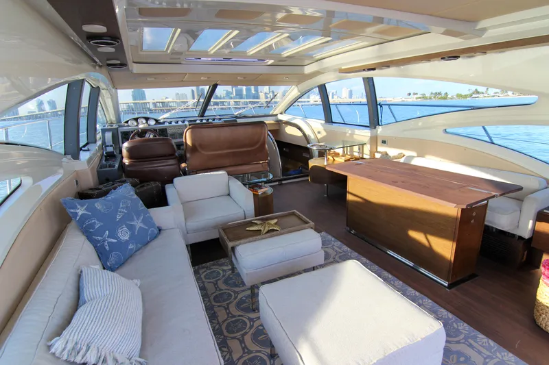  Yacht Photos Pics Luxurious interior of a 2006 Azimut 68S yacht with elegant seating and panoramic windows.