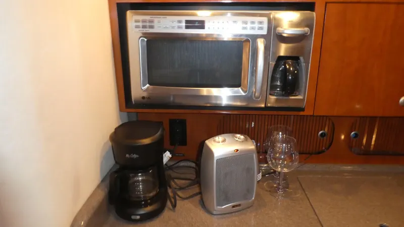  Yacht Photos Pics 2007 Sea Ray 340 Sundancer galley with microwave, coffee maker, and heater.