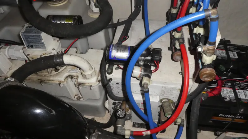  Yacht Photos Pics Engine compartment of a 2007 Sea Ray 340 Sundancer with visible wiring and components.