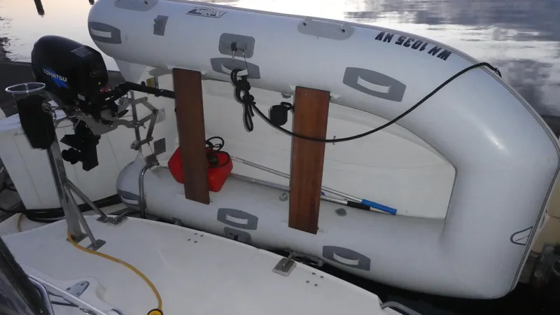  Yacht Photos Pics Inflatable dinghy mounted on 2007 Sea Ray 340 Sundancer boat with outboard motor.