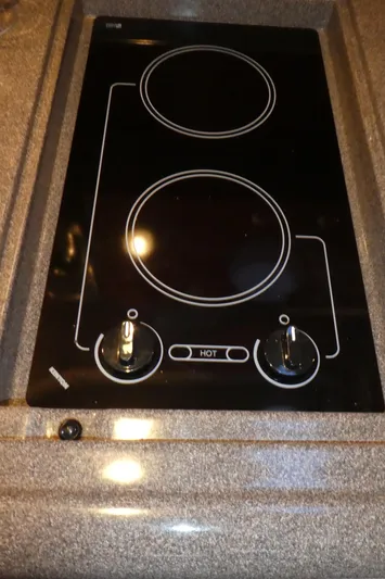  Yacht Photos Pics 2007 Sea Ray 340 Sundancer stovetop with dual burners and control knobs.