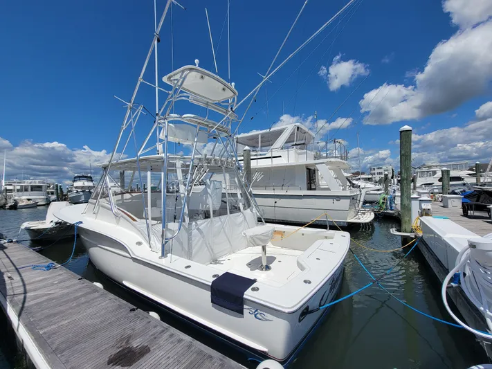  Yacht Photos Pics 2010 Jersey Cape Devil 36 boat docked at marina under clear blue sky.
