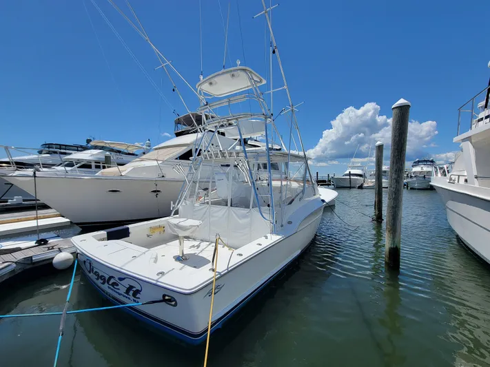  Yacht Photos Pics 2010 Jersey Cape Devil 36 boat docked at marina on a sunny day.