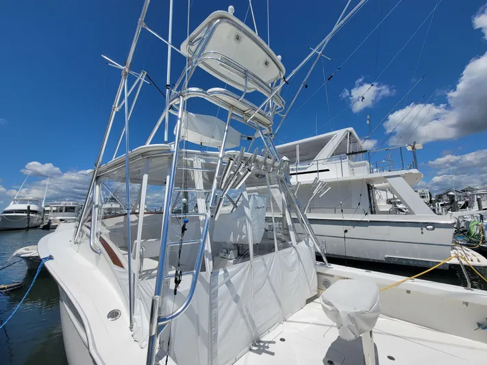  Yacht Photos Pics 2010 Jersey Cape Devil 36 boat docked at marina under clear blue sky.