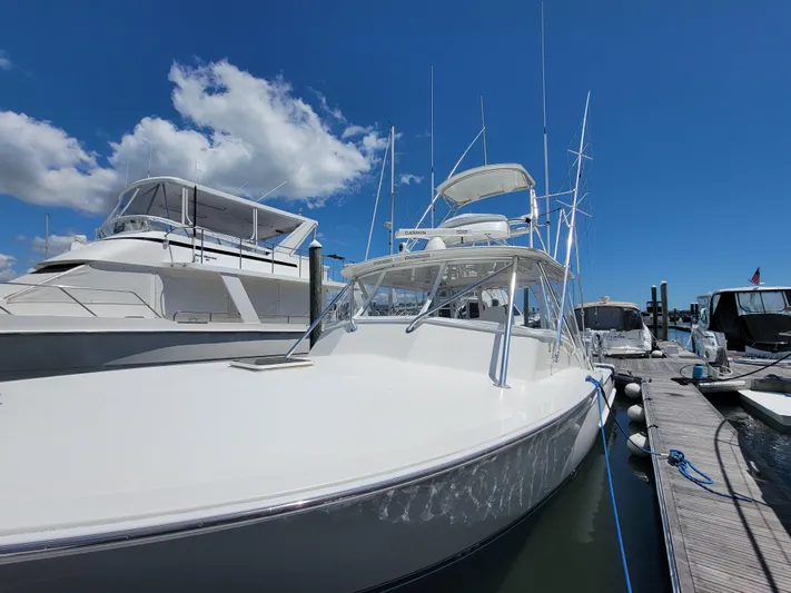  Yacht Photos Pics 2010 Jersey Cape Devil 36 boat docked at marina under clear blue sky.