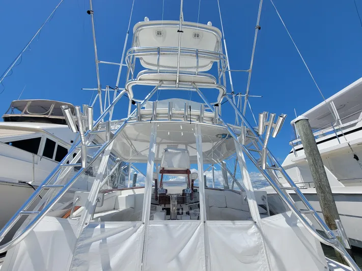  Yacht Photos Pics 2010 Jersey Cape Devil 36 sportfishing boat with tower, docked at marina.