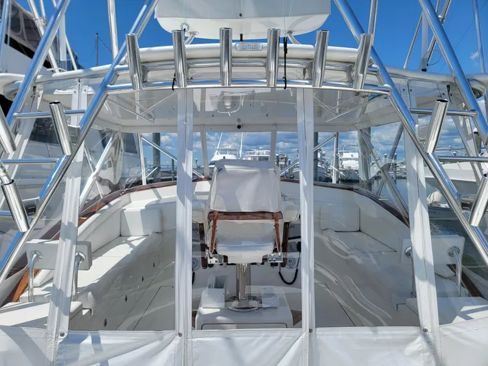  Yacht Photos Pics 2010 Jersey Cape Devil 36 boat cockpit with captain's chair and fishing rod holders.