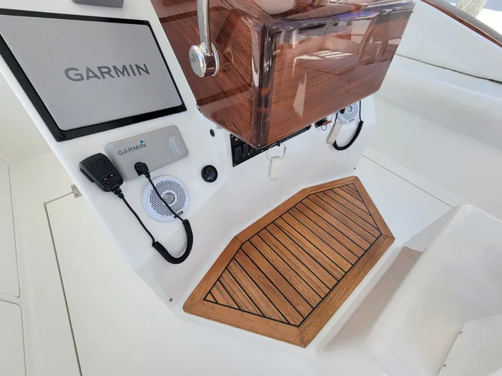  Yacht Photos Pics Jersey Cape Devil 36 2010 boat helm with Garmin electronics and teak flooring.