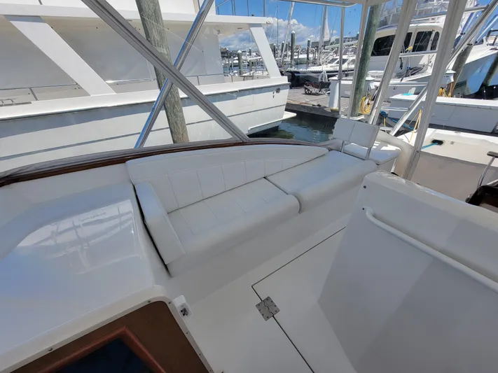  Yacht Photos Pics 2010 Jersey Cape Devil 36 boat interior with white seating at marina.