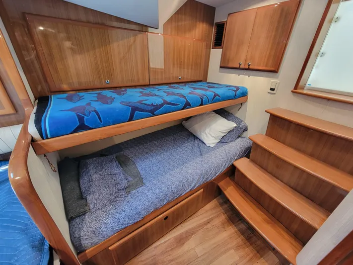  Yacht Photos Pics 2010 Jersey Cape Devil 36 cabin with bunk beds and wooden interior.