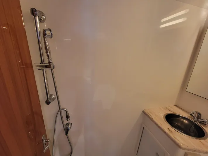  Yacht Photos Pics 2010 Jersey Cape Devil 36 boat bathroom with shower and sink.