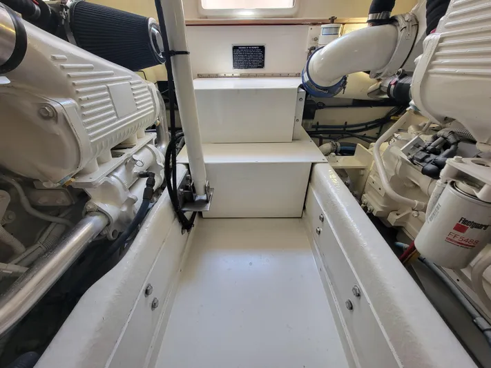  Yacht Photos Pics Engine room of a 2010 Jersey Cape Devil 36 boat with twin engines.