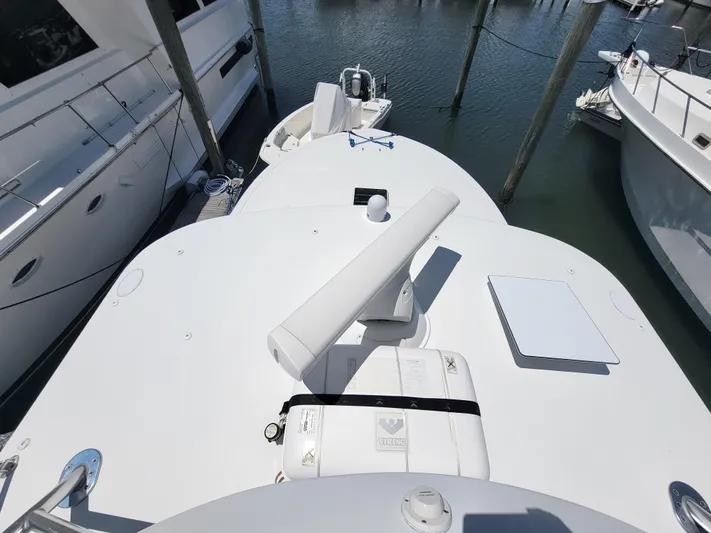  Yacht Photos Pics 2010 Jersey Cape Devil 36 boat docked at marina, top deck view.