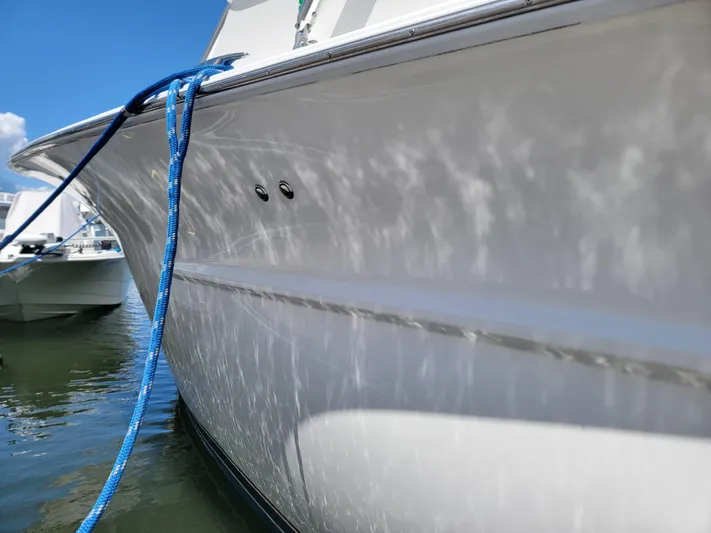  Yacht Photos Pics 2010 Jersey Cape Devil 36 boat docked with blue rope.