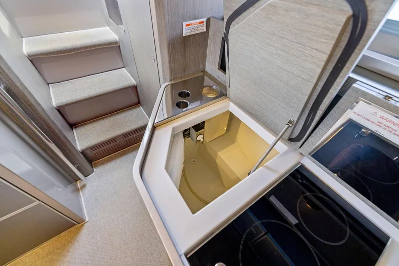 St Peter Yacht Photos Pics 2016 Riva 44 Rivarama Super yacht interior with modern kitchen and stairs.