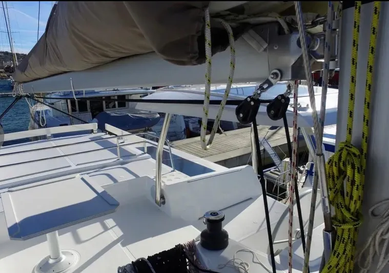  Yacht Photos Pics 2023 Bali 4.4 yacht deck with rigging and winch, docked at marina.